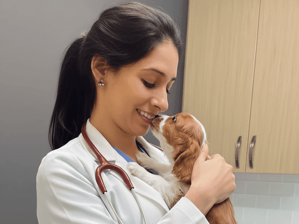 Dr. Amelia Khan with small dog